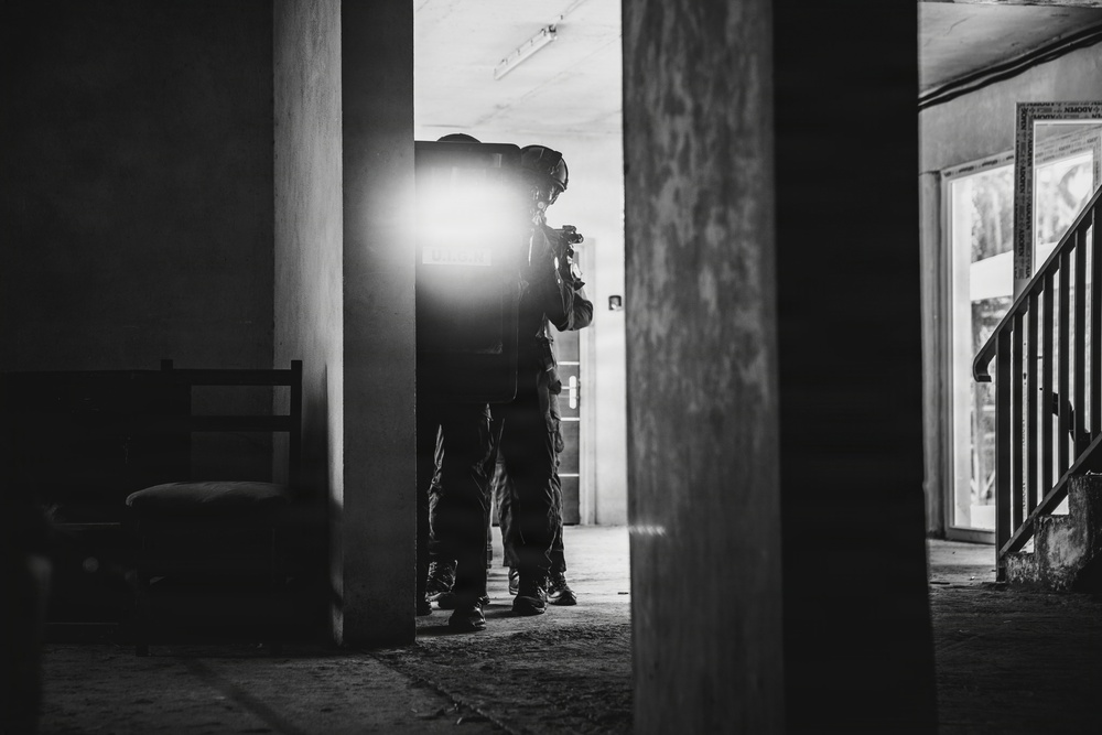 Ivorian national police officers execute urban clearing operations during Flintlock 26