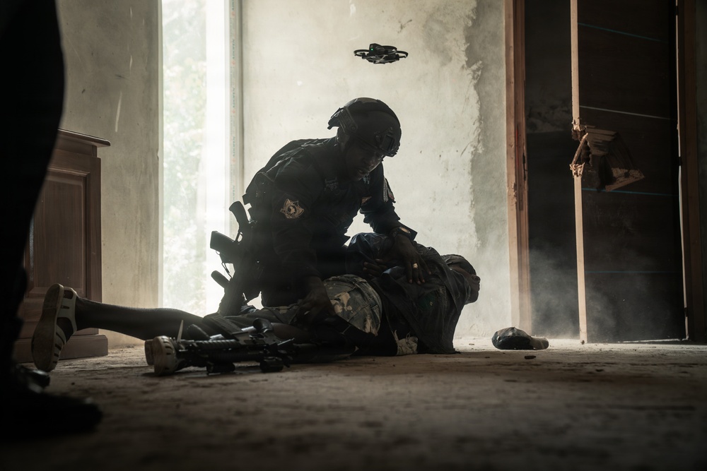 Ivorian national police officers execute urban clearing operations during Flintlock 26