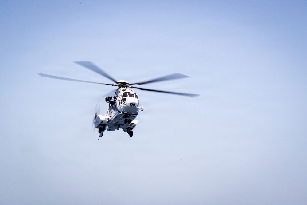 Frank E. Petersen Jr. Conducts Vertical Replenishment-at-Sea with Wally Schirra