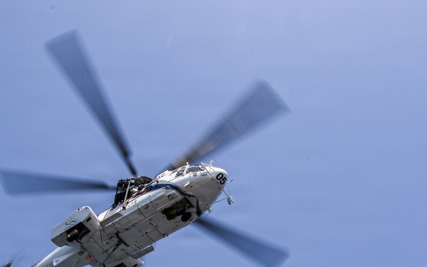 Frank E. Petersen Jr. Conducts Vertical Replenishment-at-Sea with Wally Schirra