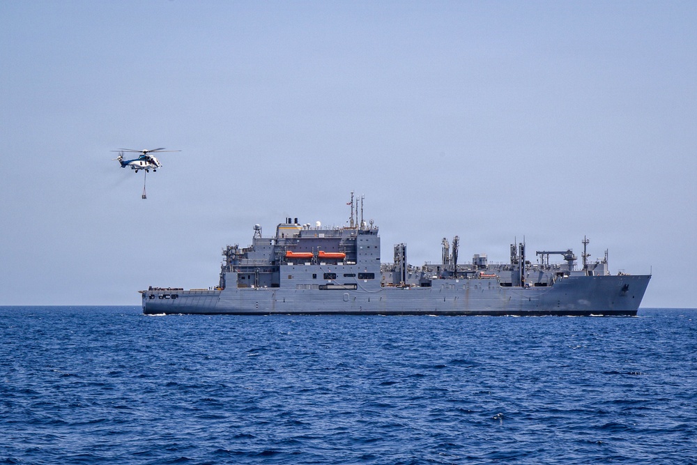 Frank E. Petersen Jr. Conducts Vertical Replenishment-at-Sea with Wally Schirra