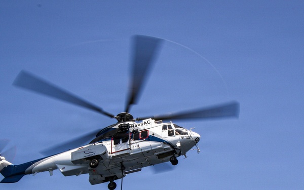 Frank E. Petersen Jr. Conducts Vertical Replenishment-at-Sea with Wally Schirra