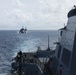 USS Carl M. Levin sails in formation with USS Charleston and USS Decatur