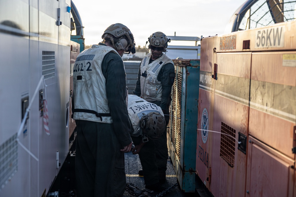 ACU-5 Sailors Transport Generators during DSCA Operations