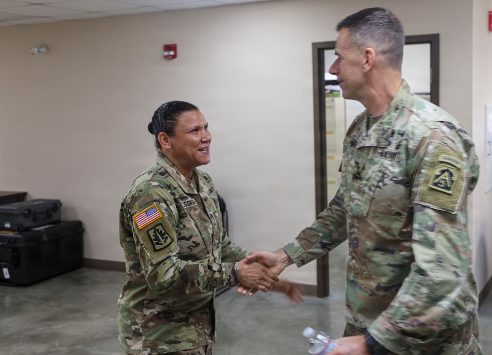 General Pepin Presents Coins to JTF-CS