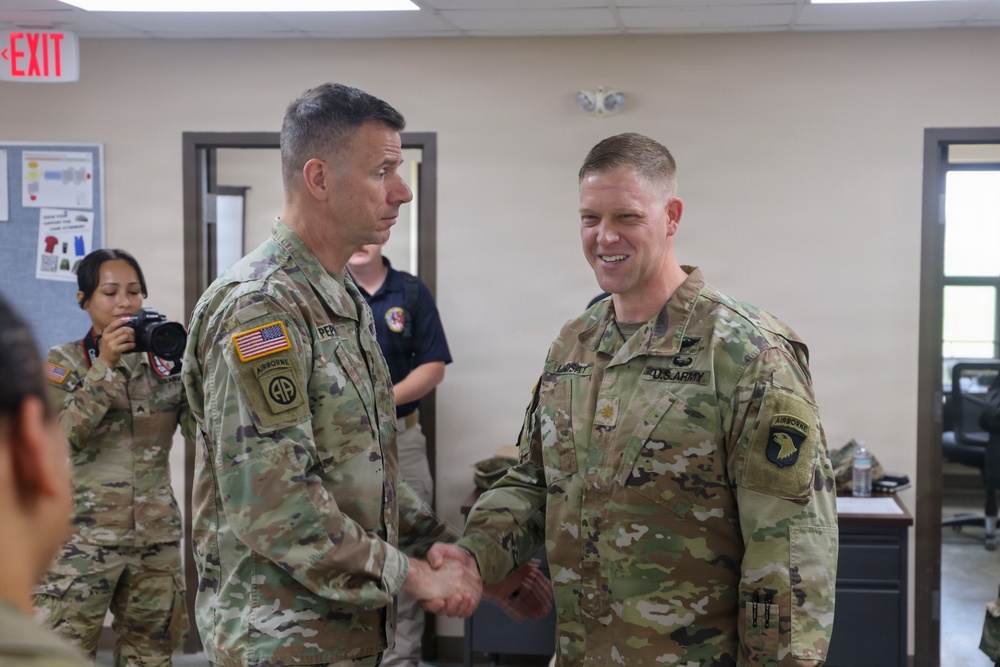 General Pepin Presents Coins to JTF-CS