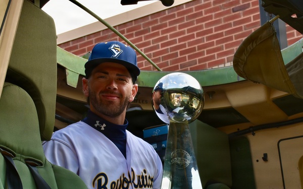 Third baseman Brandon Lewis with the Atlantic League Championship Trophy
