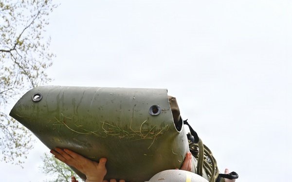Strength and Teamwork: Soldiers Conquer the Wall