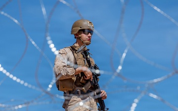 U.S. Marines with JTF-SB repair breach sites along southern barrier