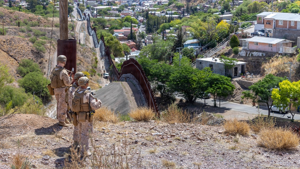 U.S. Marines with JTF-SB repair breach sites along southern barrier