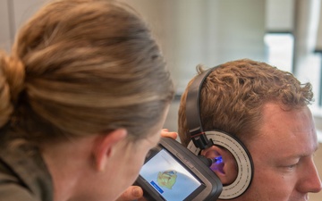 Naval Aviator outfitted for Custom Ear Protection
