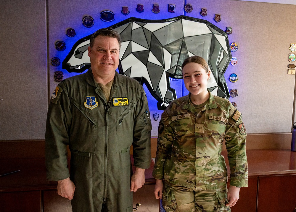 168th Wing Commander presents his Commander Coin to 354th Medical Group Airmen
