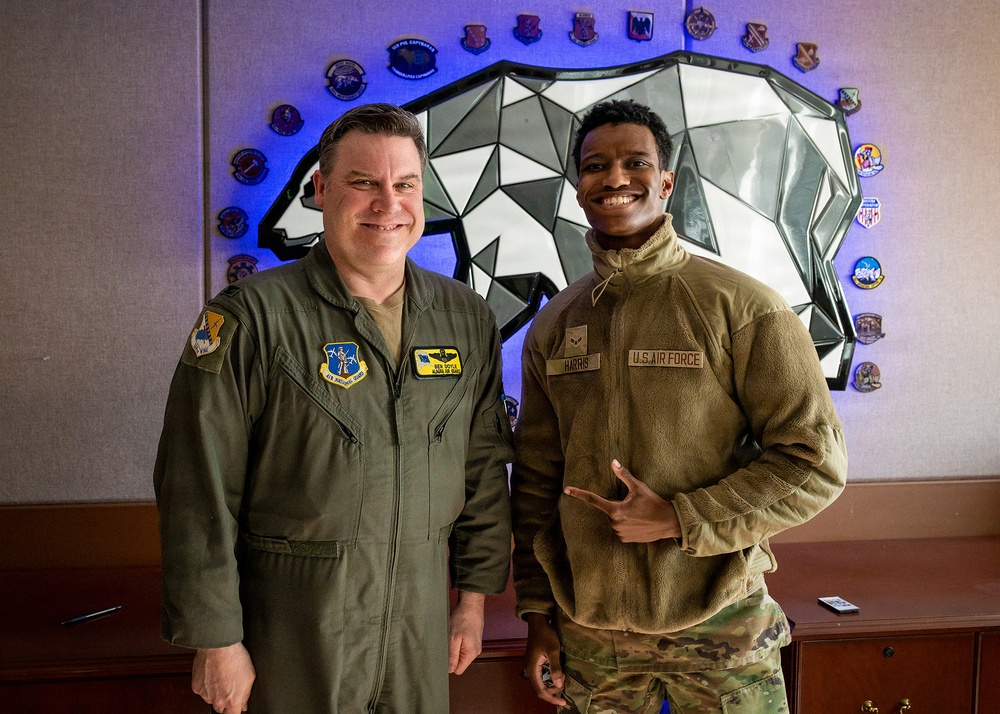 168th Wing Commander presents his Commander Coin to 354th Medical Group Airmen