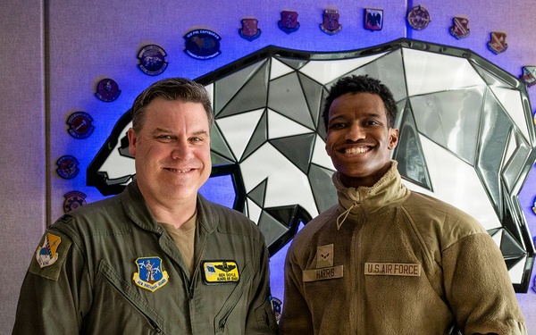 168th Wing Commander presents his Commander Coin to 354th Medical Group Airmen