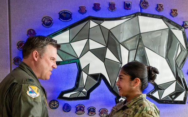 168th Wing Commander presents his Commander Coin to 354th Medical Group Airmen