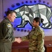 168th Wing Commander presents his Commander Coin to 354th Medical Group Airmen