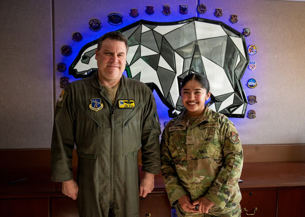 168th Wing Commander presents his Commander Coin to 354th Medical Group Airmen