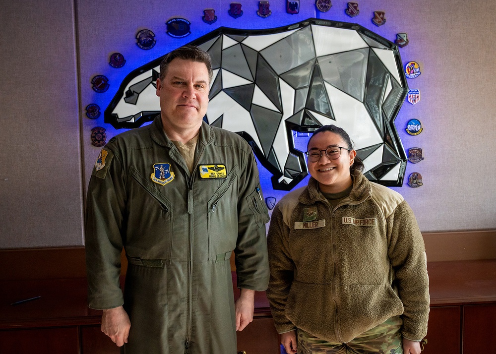168th Wing Commander presents his Commander Coin to 354th Medical Group Airmen