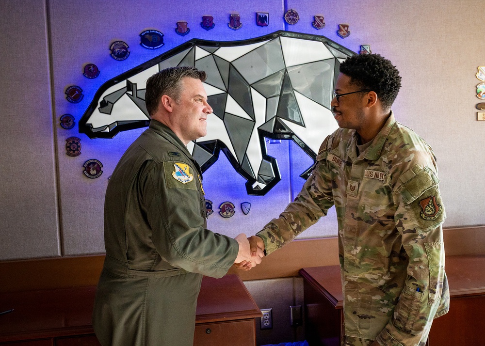 168th Wing Commander presents his Commander Coin to 354th Medical Group Airmen
