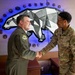 168th Wing Commander presents his Commander Coin to 354th Medical Group Airmen