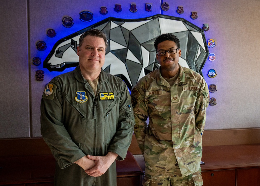 168th Wing Commander presents his Commander Coin to 354th Medical Group Airmen