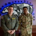 168th Wing Commander presents his Commander Coin to 354th Medical Group Airmen