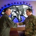 168th Wing Commander presents his Commander Coin to 354th Medical Group Airmen