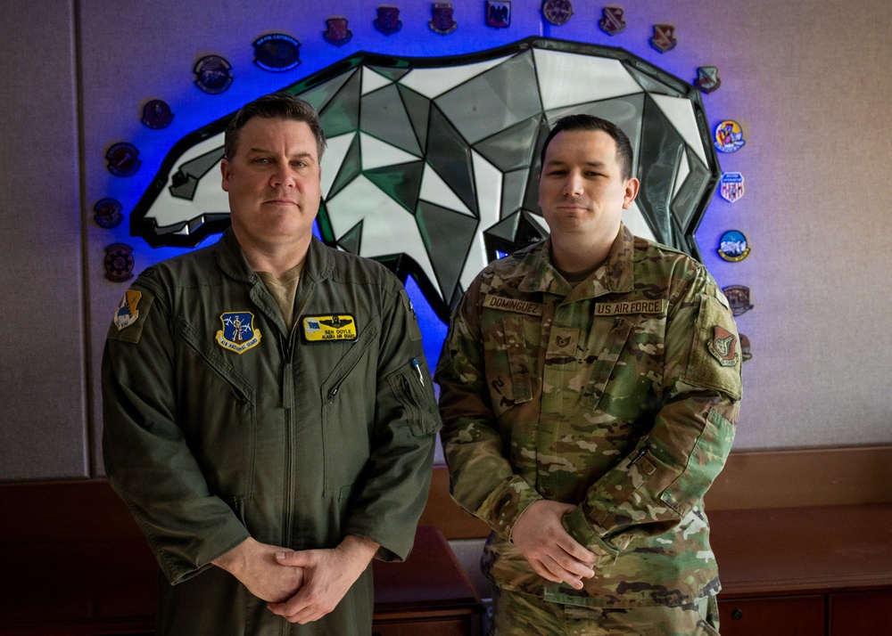 168th Wing Commander presents his Commander Coin to 354th Medical Group Airmen