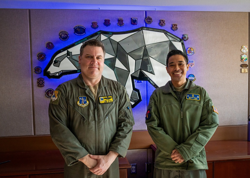 168th Wing Commander presents his Commander Coin to 354th Medical Group Airmen