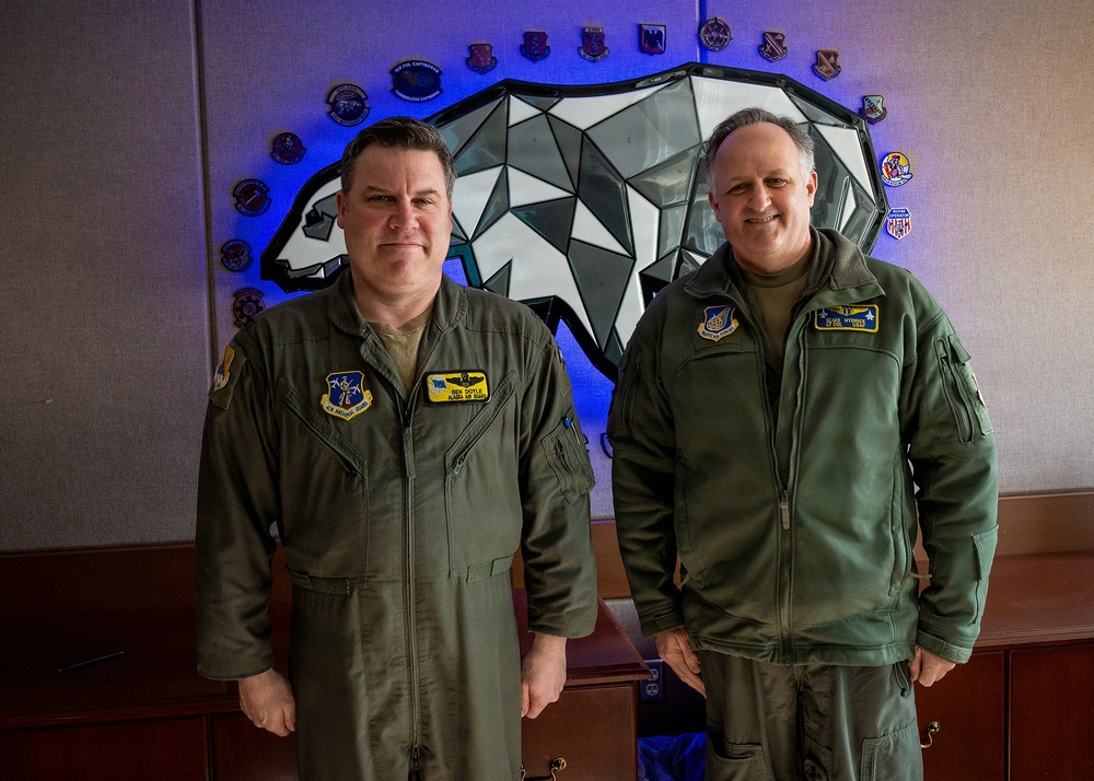 168th Wing Commander presents his Commander Coin to 354th Medical Group Airmen