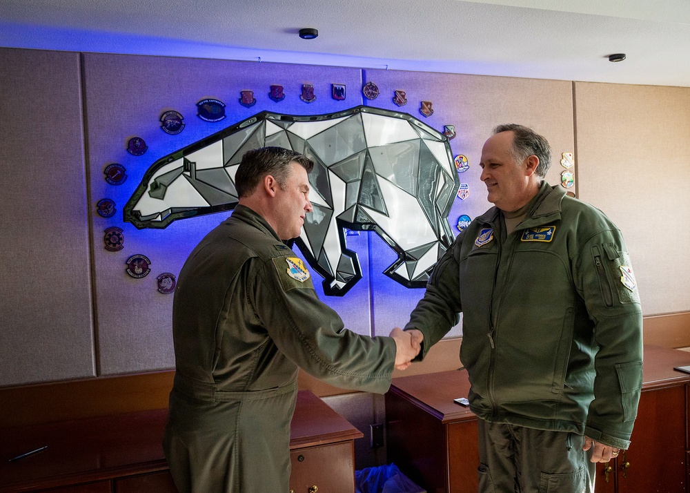 168th Wing Commander presents his Commander Coin to 354th Medical Group Airmen