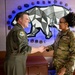 168th Wing Commander presents his Commander Coin to 354th Medical Group Airmen