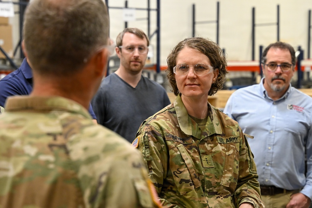 U.S. Army Tank-automotive and Armaments Command and Capability Program Executive for Combat Logistics team members field Refrigeration Tool Kits to members of Wisconsin Army National Guard