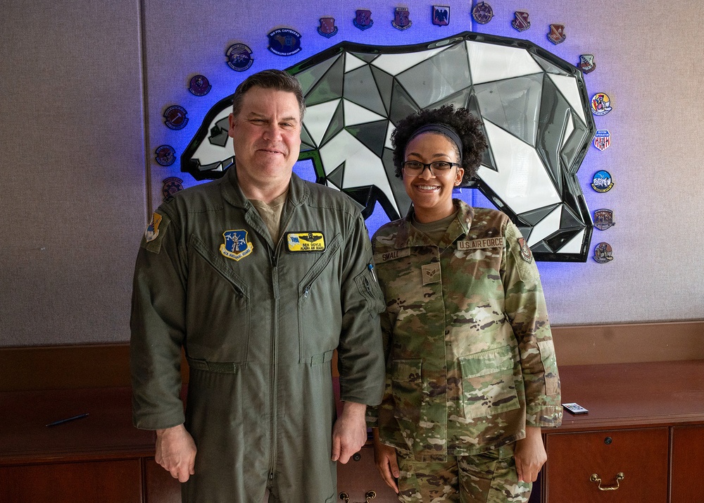 168th Wing Commander presents his Commander Coin to 354th Medical Group Airmen