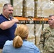 U.S. Army Tank-automotive and Armaments Command and Capability Program Executive for Combat Logistics team members field Refrigeration Tool Kits to members of Wisconsin Army National Guard