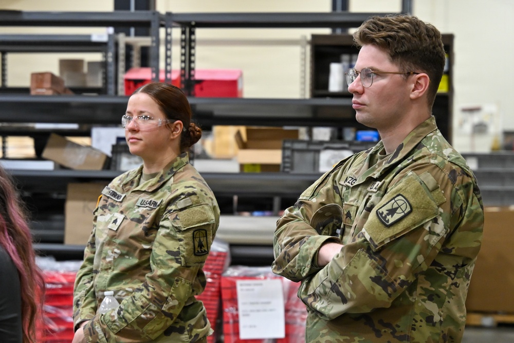 U.S. Army Tank-automotive and Armaments Command and Capability Program Executive for Combat Logistics team members field Refrigeration Tool Kits to members of Wisconsin Army National Guard