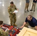 U.S. Army Tank-automotive and Armaments Command and Capability Program Executive for Combat Logistics team members field Refrigeration Tool Kits to members of Wisconsin Army National Guard