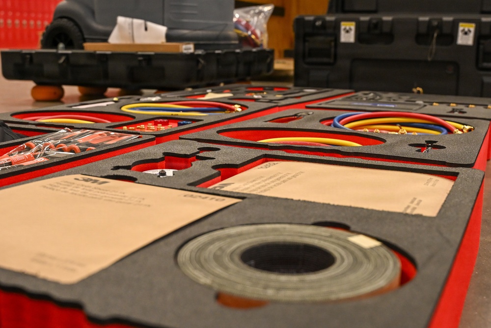 U.S. Army Tank-automotive and Armaments Command and Capability Program Executive for Combat Logistics team members field Refrigeration Tool Kits to members of Wisconsin Army National Guard