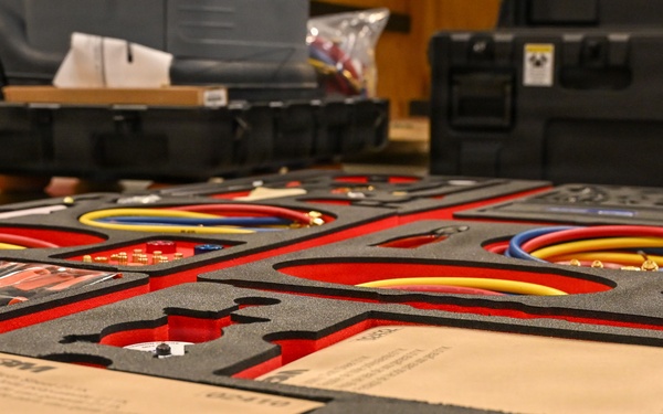 U.S. Army Tank-automotive and Armaments Command and Capability Program Executive for Combat Logistics team members field Refrigeration Tool Kits to members of Wisconsin Army National Guard