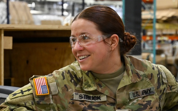 U.S. Army Tank-automotive and Armaments Command and Capability Program Executive for Combat Logistics team members field Refrigeration Tool Kits to members of Wisconsin Army National Guard
