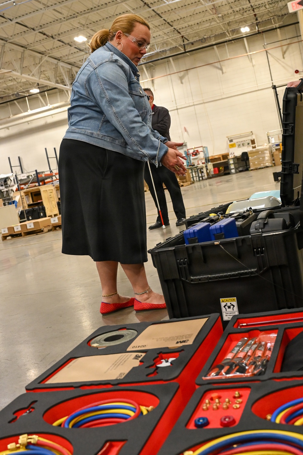 U.S. Army Tank-automotive and Armaments Command and Capability Program Executive for Combat Logistics team members field Refrigeration Tool Kits to members of Wisconsin Army National Guard