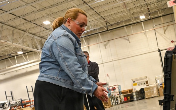 U.S. Army Tank-automotive and Armaments Command and Capability Program Executive for Combat Logistics team members field Refrigeration Tool Kits to members of Wisconsin Army National Guard