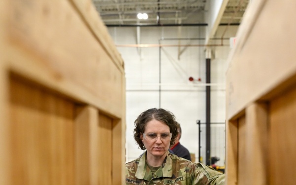U.S. Army Tank-automotive and Armaments Command and Capability Program Executive for Combat Logistics team members field Refrigeration Tool Kits to members of Wisconsin Army National Guard