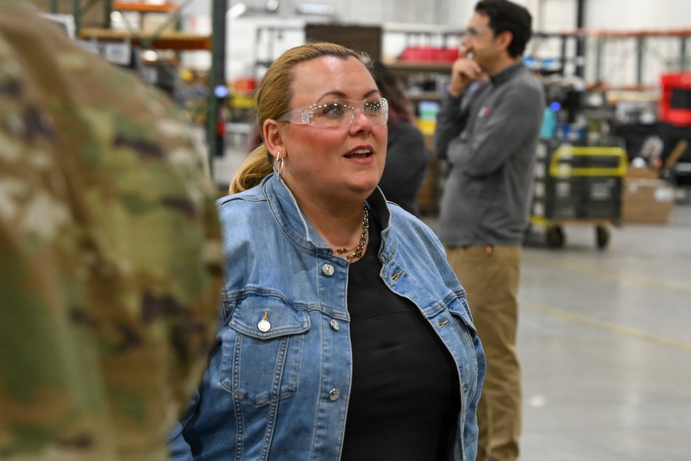 U.S. Army Tank-automotive and Armaments Command and Capability Program Executive for Combat Logistics team members field Refrigeration Tool Kits to members of Wisconsin Army National Guard