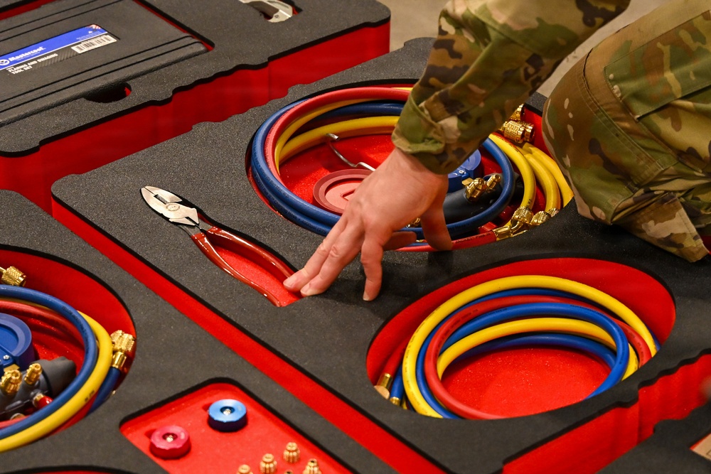 U.S. Army Tank-automotive and Armaments Command and Capability Program Executive for Combat Logistics team members field Refrigeration Tool Kits to members of Wisconsin Army National Guard
