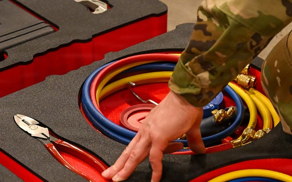 U.S. Army Tank-automotive and Armaments Command and Capability Program Executive for Combat Logistics team members field Refrigeration Tool Kits to members of Wisconsin Army National Guard