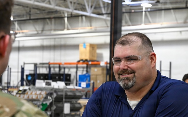U.S. Army Tank-automotive and Armaments Command and Capability Program Executive for Combat Logistics team members field Refrigeration Tool Kits to members of Wisconsin Army National Guard