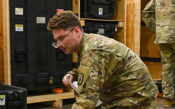 U.S. Army Tank-automotive and Armaments Command and Capability Program Executive for Combat Logistics team members field Refrigeration Tool Kits to members of Wisconsin Army National Guard