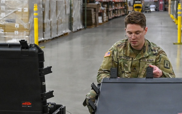 U.S. Army Tank-automotive and Armaments Command and Capability Program Executive for Combat Logistics team members field Refrigeration Tool Kits to members of Wisconsin Army National Guard