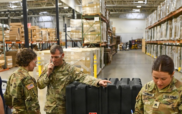U.S. Army Tank-automotive and Armaments Command and Capability Program Executive for Combat Logistics team members field Refrigeration Tool Kits to members of Wisconsin Army National Guard